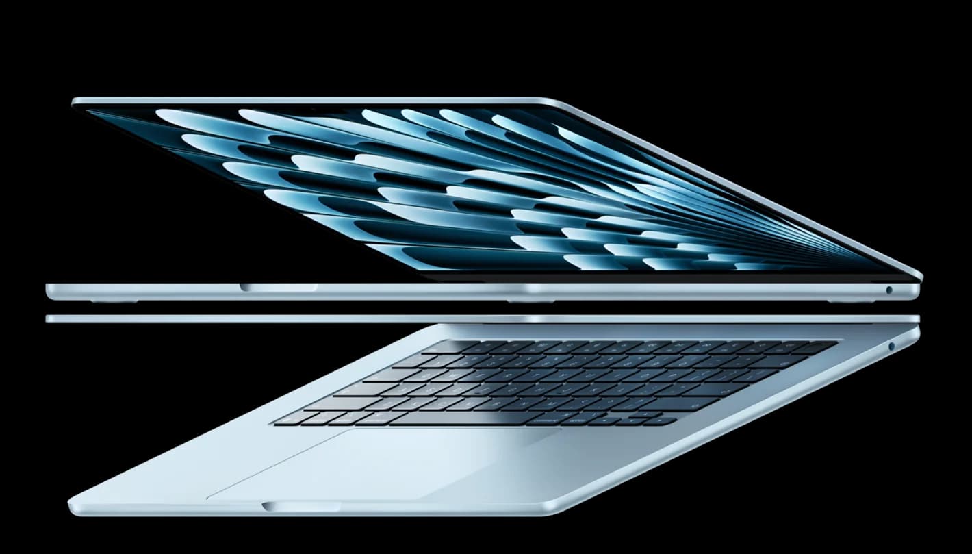 Apple MacBook Air 15" open, mirrored above its own reflection